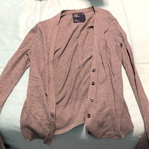 grey cardigan, holes (design), etc.